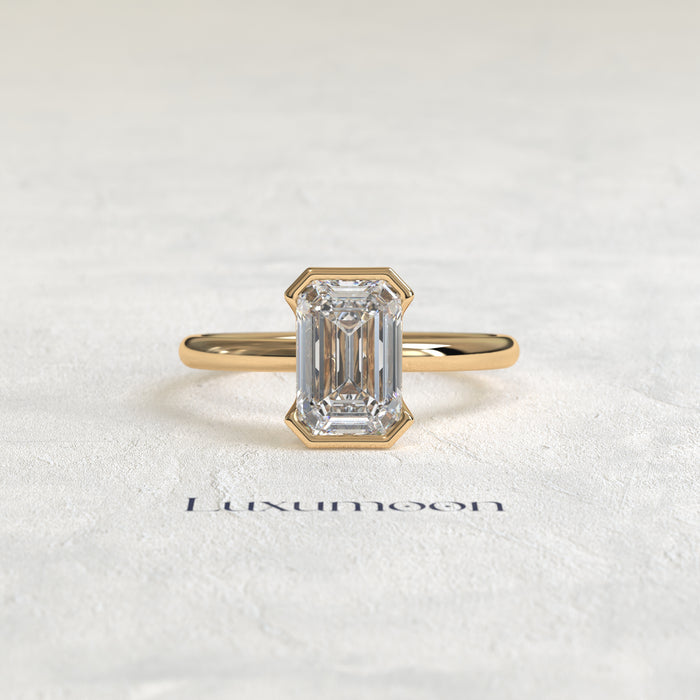 The Elenthia – 3 CT Emerald Half Bezel Diamond Ring