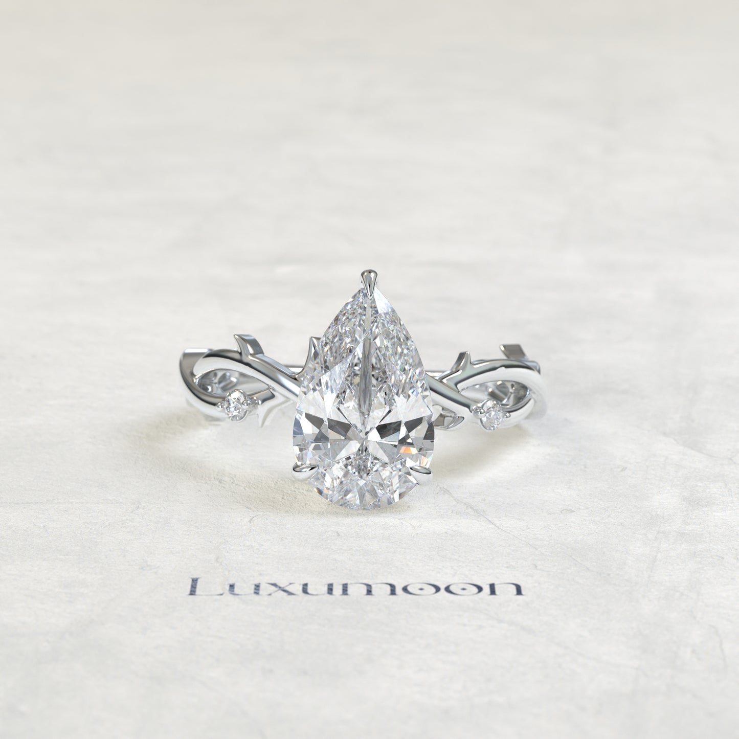 Bague de fiançailles Rexa – Diamant poire de 2,5 carats, motif feuille de vigne