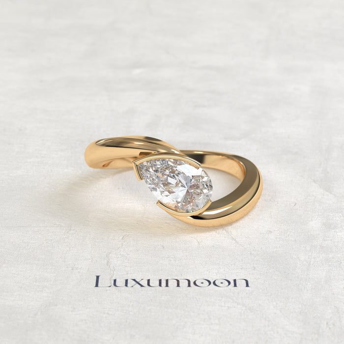 The Aeris – 2 CT Curved Pear Diamond Engagement Ring