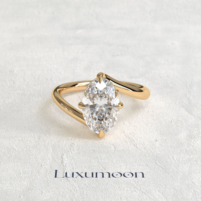 The Eryn – Oval Diamond Top Bottom Wave Engagement Ring