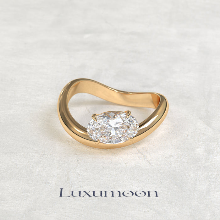 The Rynel – 2 CT Oval Slept On Ocean Wave Engagement Ring