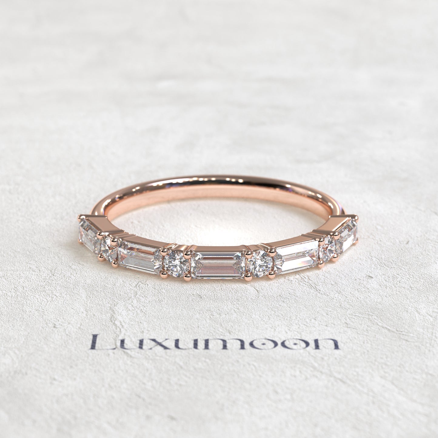 The Elura – East West Baguette & Round Diamond Band
