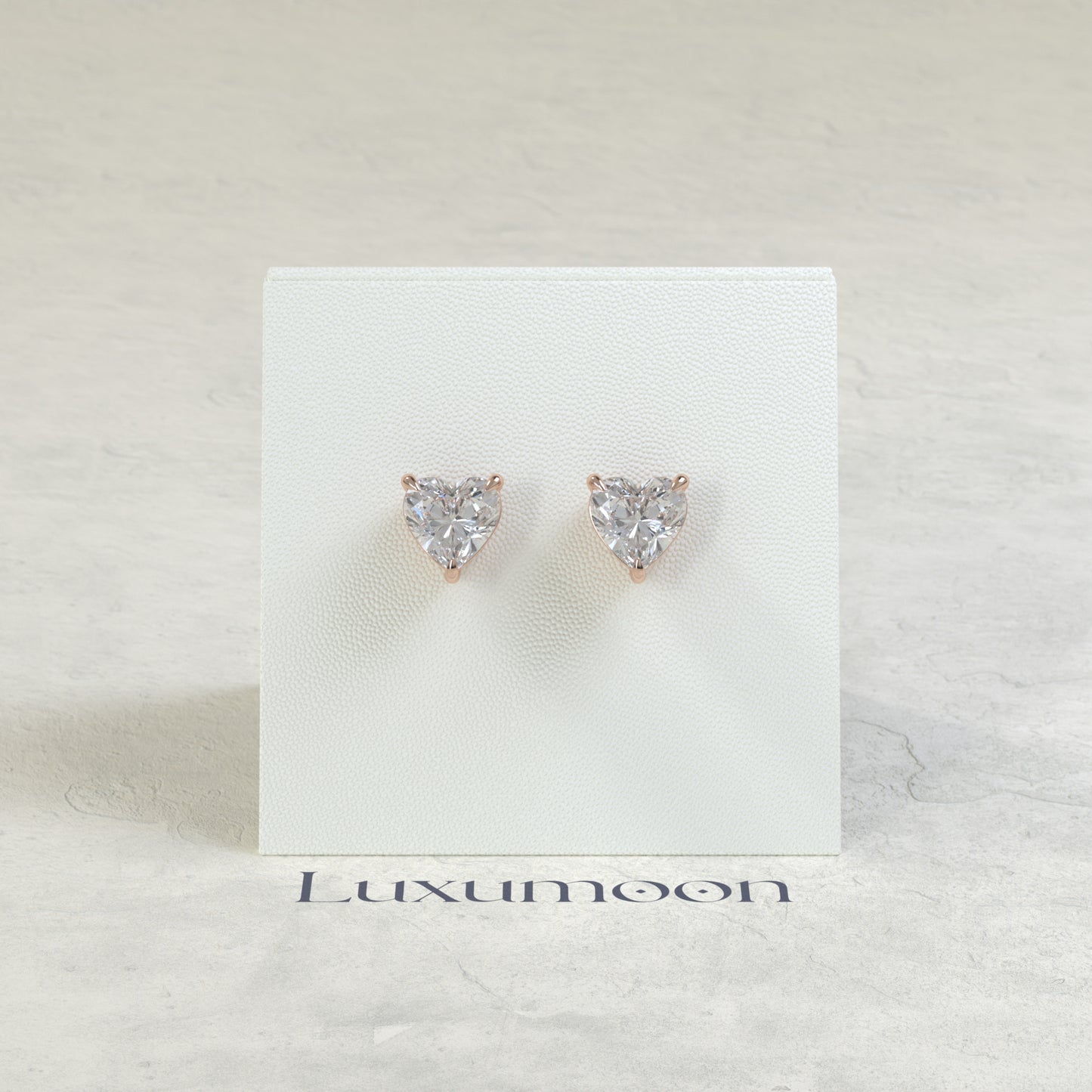 The Orin – 3 Ct Heart Diamond Solitaire Studs in Classic Prong Basket