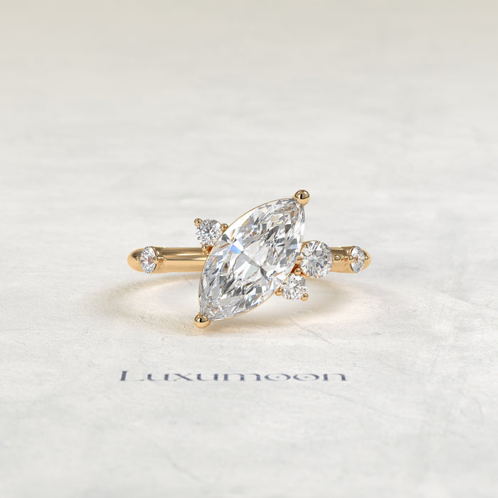 The Ziven – Marquise Solitaire Diamond Ring with Scattered Round Diamond Accents