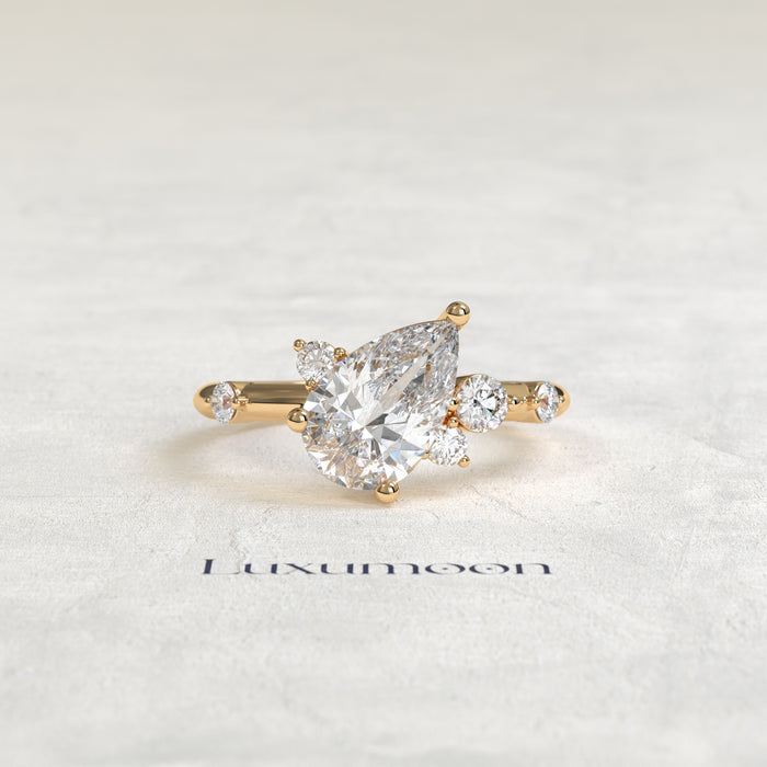 The Aure – Pear Cut Lab Grown Diamond Scattered Accent Engagement Ring