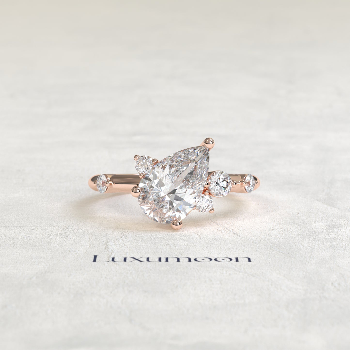 The Aure – Pear Cut Lab Grown Diamond Scattered Accent Engagement Ring