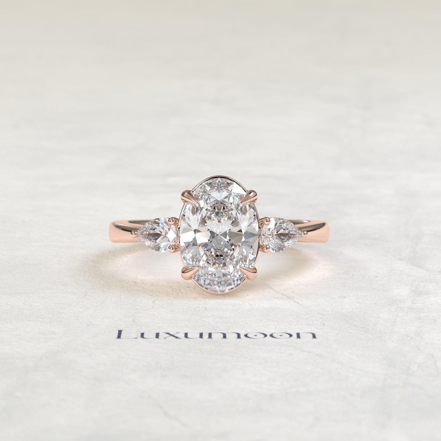 The Lyna – Oval & Pear Lab Grown Diamond Classic Three Stone Engagement Ring