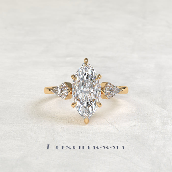 The Qela – Marquise Cut Lab Grown Diamond Kite Side Stone Three Stone Engagement Ring