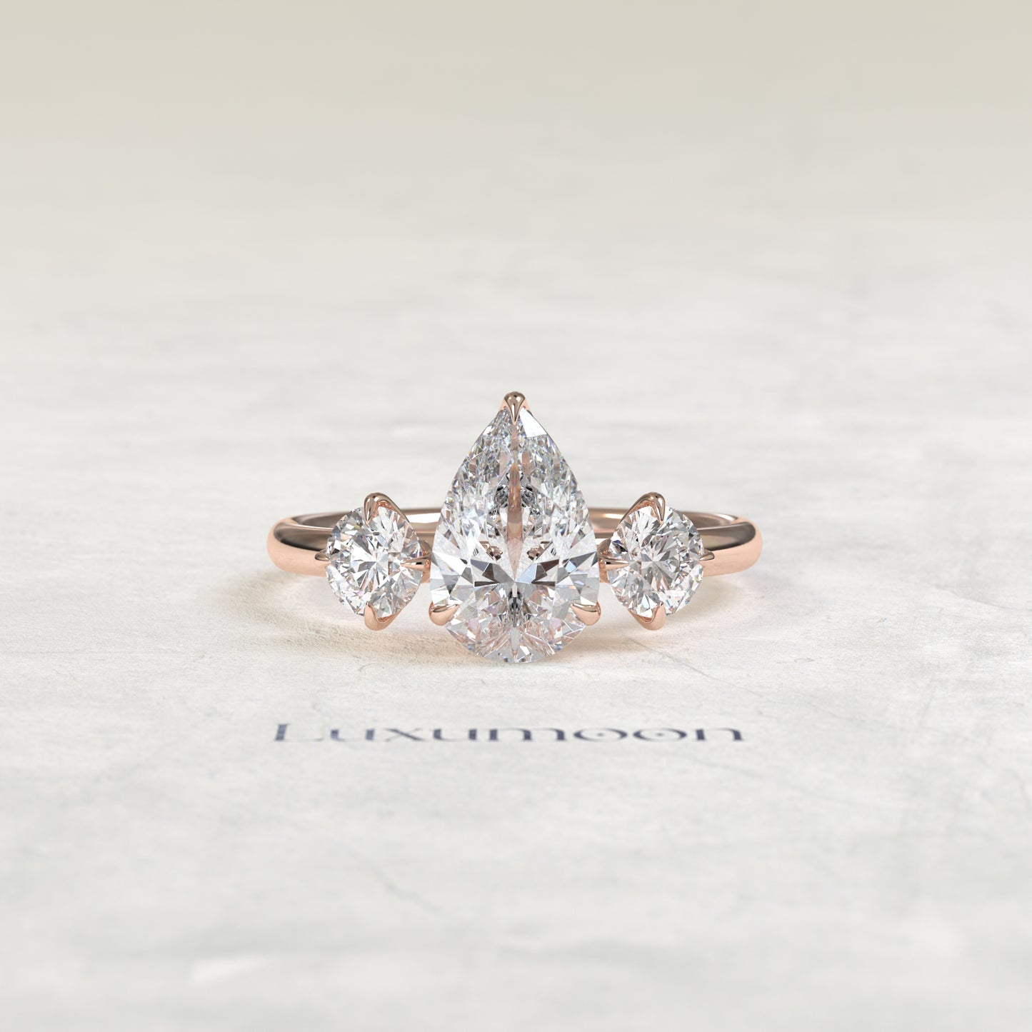 The Piela – Pear Lab Grown Diamond Three Stone Ornate Filigree Cathedral Engagement Ring
