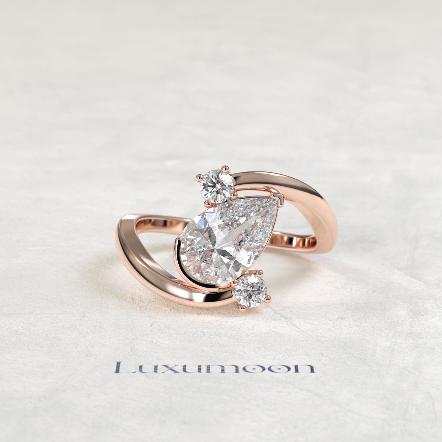 The Geova – Pear Lab Grown Diamond Open Bypass Tilted Setting Round Diamond Engagement Ring