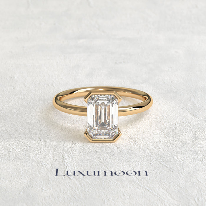The Elenthia – 3 CT Emerald Half Bezel Diamond Ring
