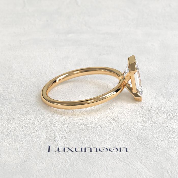 The Elenthia – 3 CT Emerald Half Bezel Diamond Ring