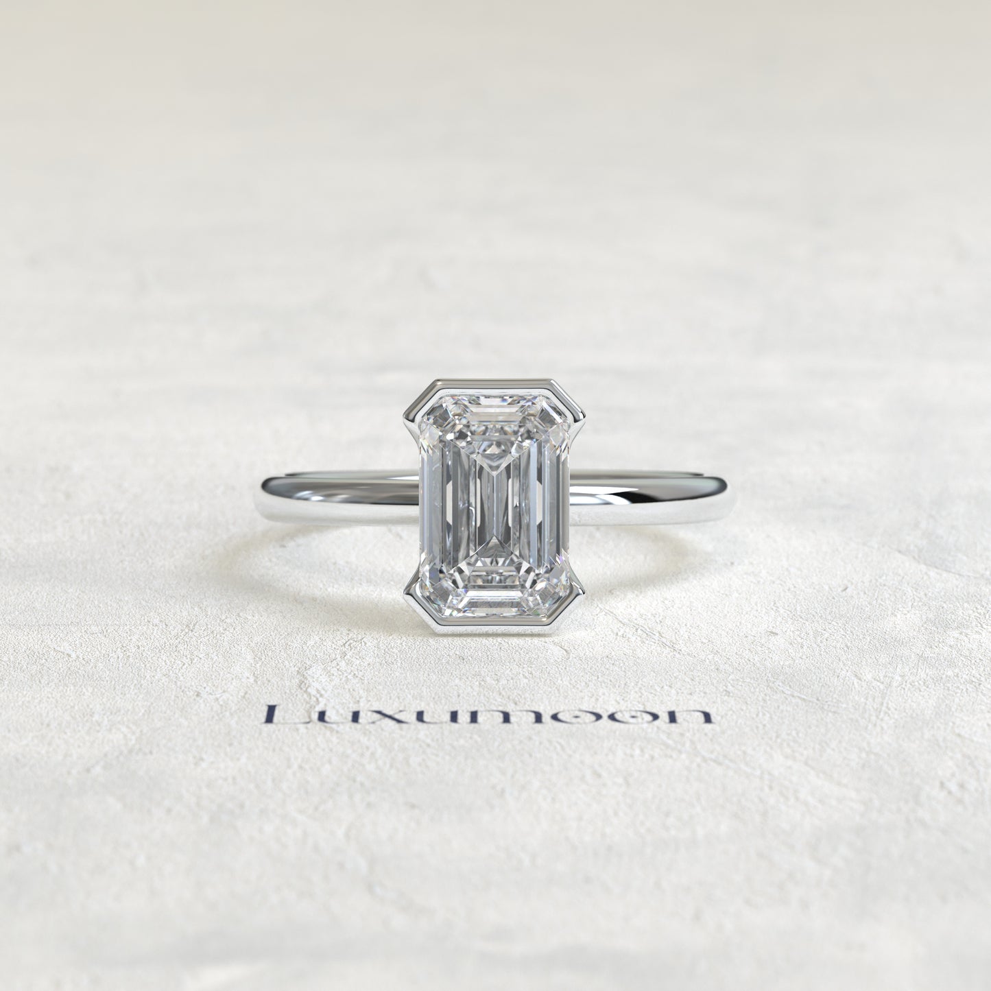 The Elenthia – 3 CT Emerald Half Bezel Diamond Ring