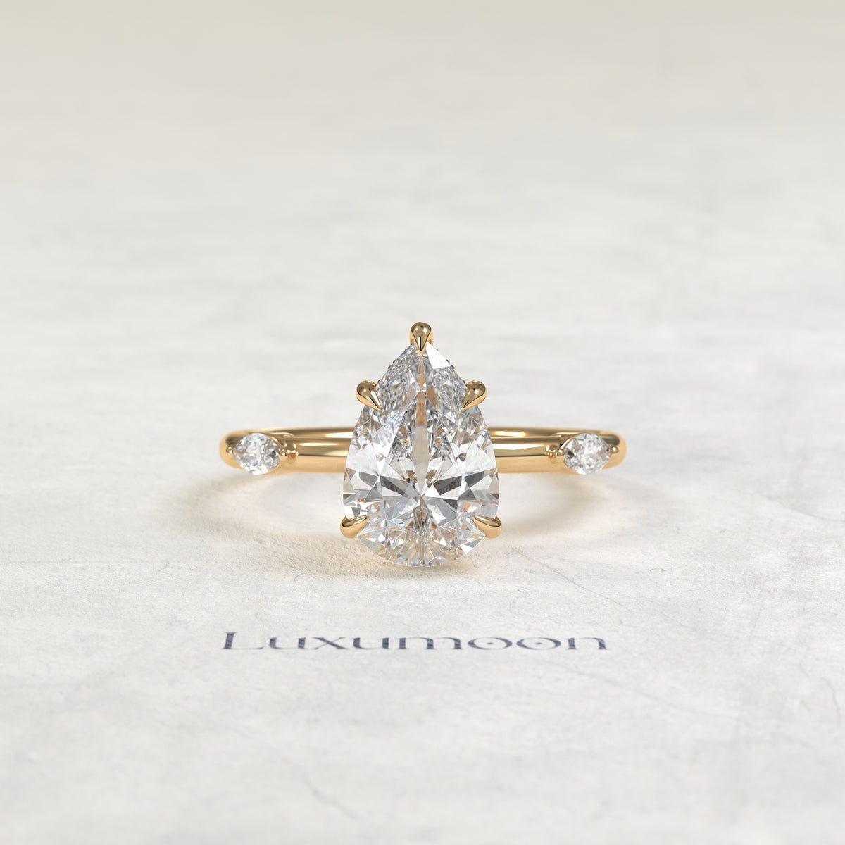 Bague Dervelle – Diamants taille poire 2 carats sertis d'un halo caché et d'un pavé de diamants marquise