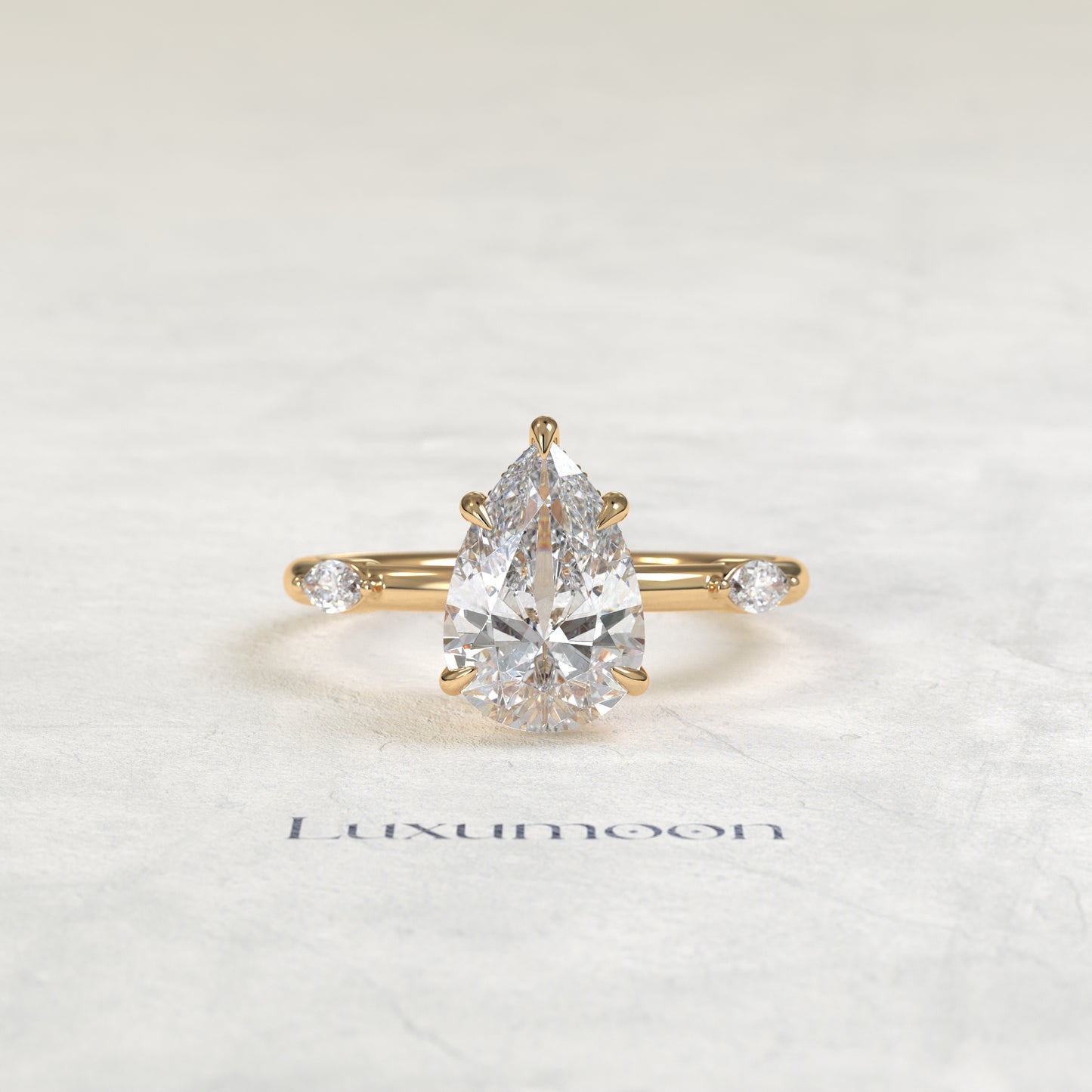 Bague Dervelle – Diamants taille poire 2 carats sertis d'un halo caché et d'un pavé de diamants marquise