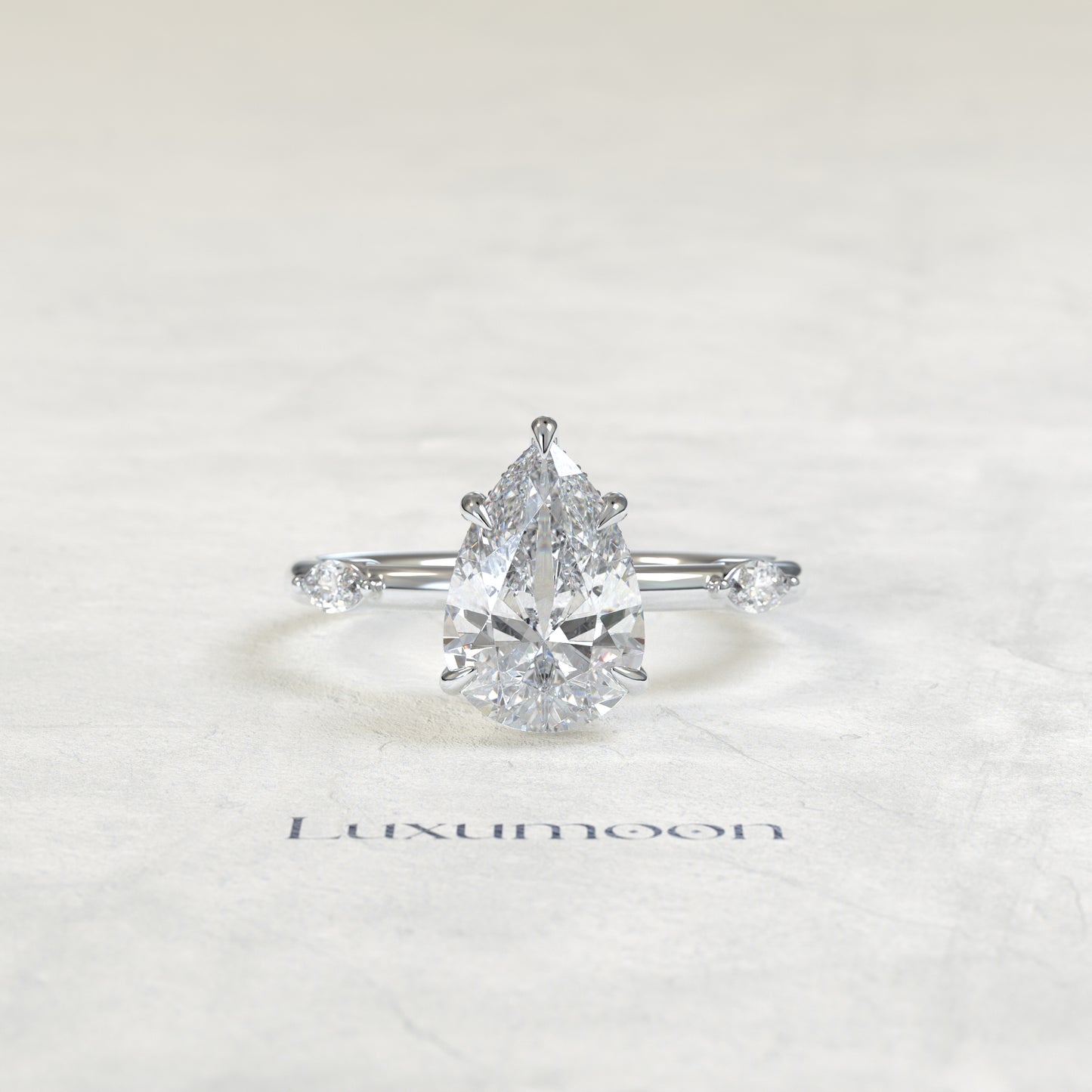Bague Dervelle – Diamants taille poire 2 carats sertis d'un halo caché et d'un pavé de diamants marquise