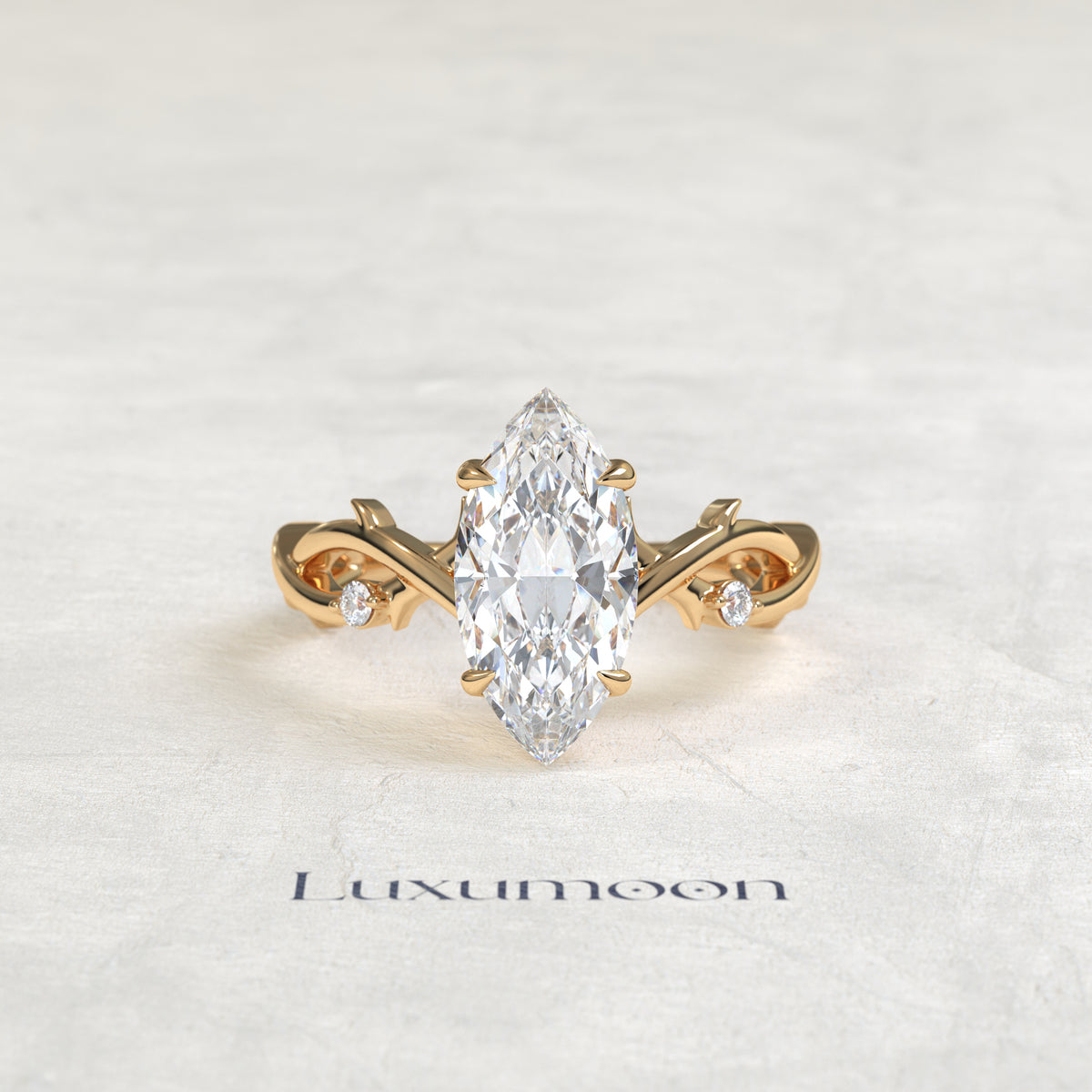 El anillo de compromiso de hoja de vid con diamante marquesa de 1,5 quilates Elya