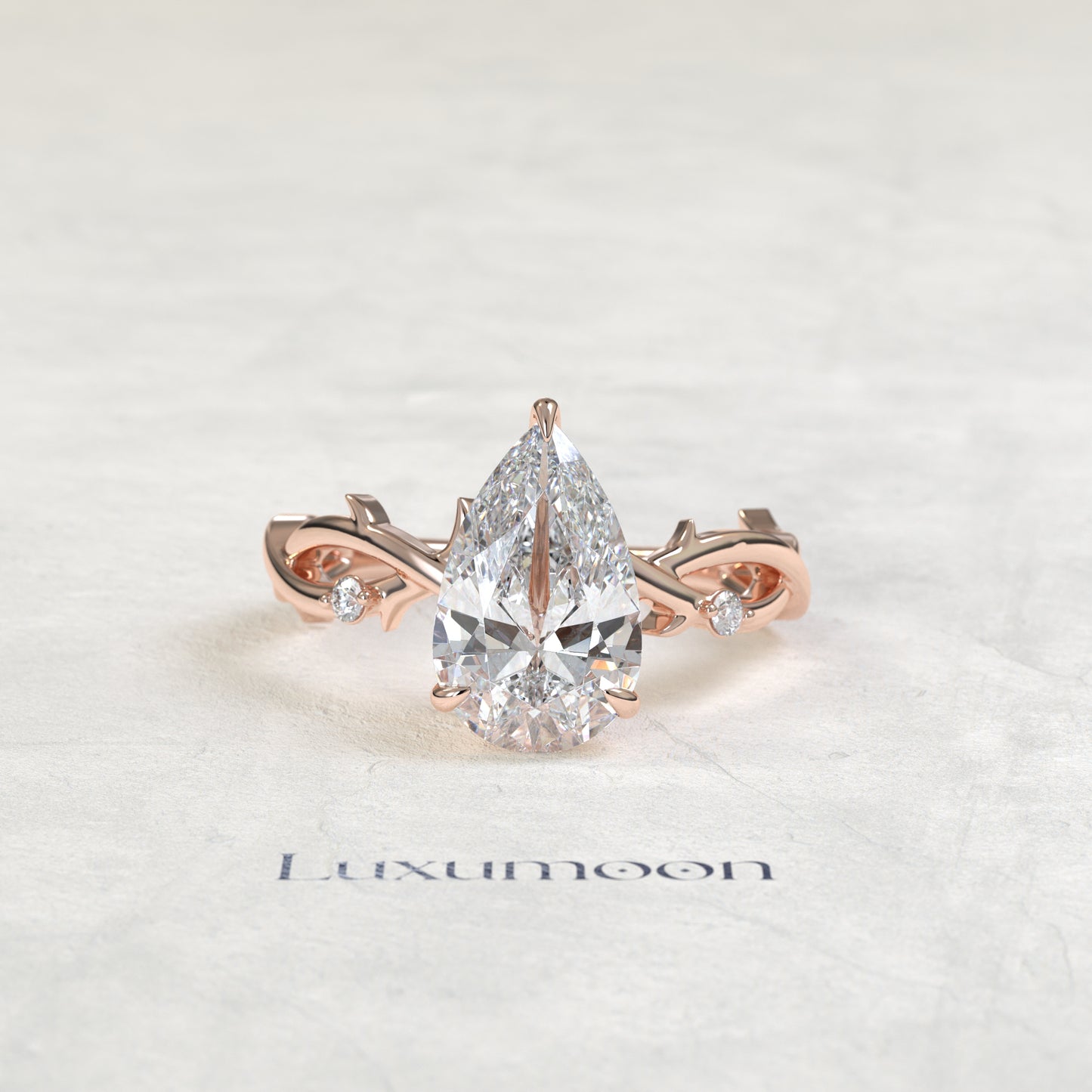 Bague de fiançailles Rexa – Diamant poire de 2,5 carats, motif feuille de vigne