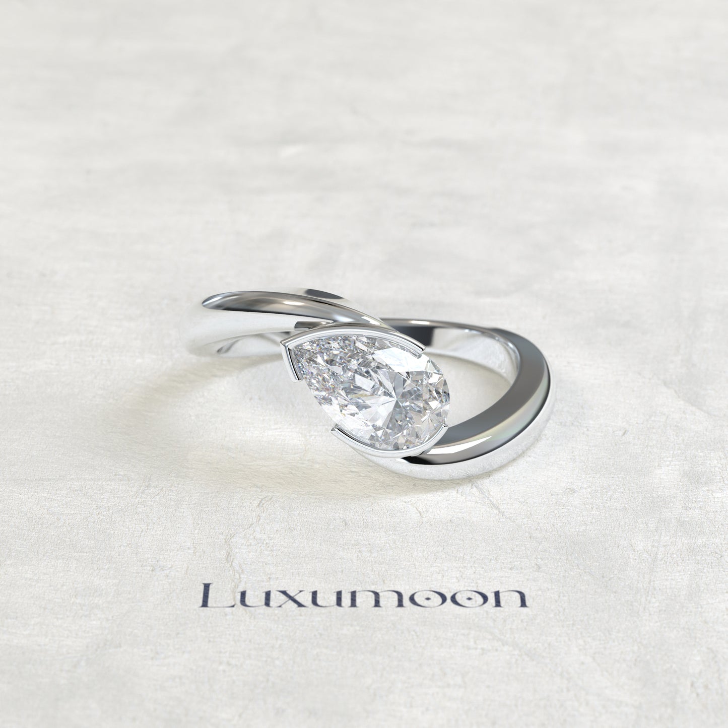 Anillo de compromiso Aeris – 2 CT con diamante de pera curvado