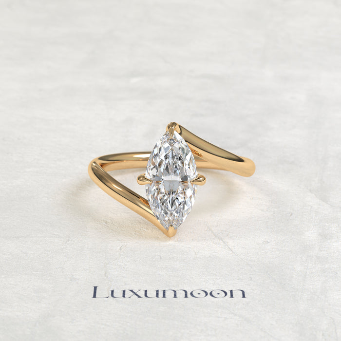 Bague de fiançailles Aeva – Diamant marquise, motif vague en haut et en bas