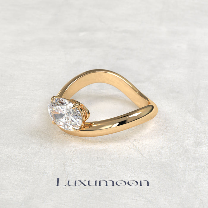 The Rynel – 2 CT Oval Slept On Ocean Wave Engagement Ring