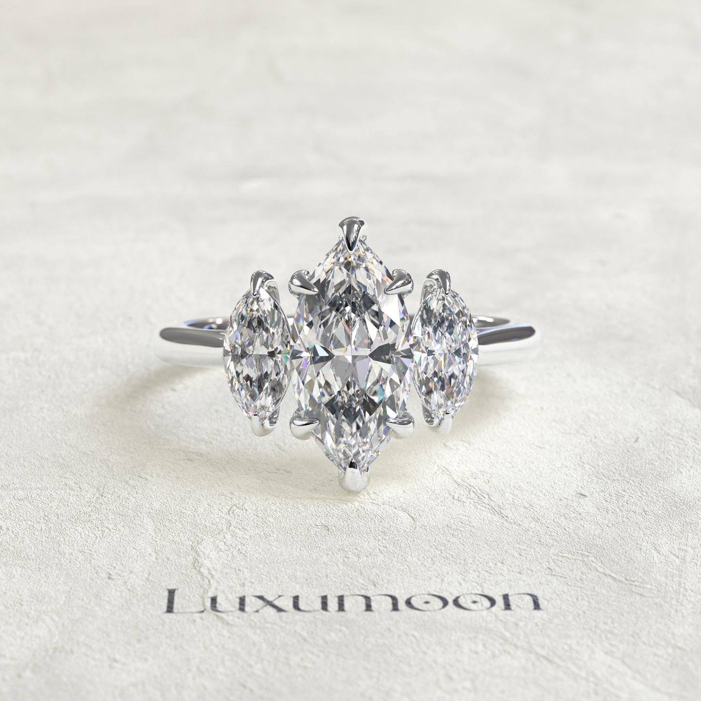 The Aureline - 1.5 CT Marquise Three stone diamond ring