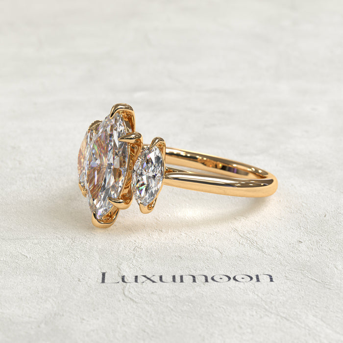 The Aureline - 1.5 CT Marquise Three stone diamond ring