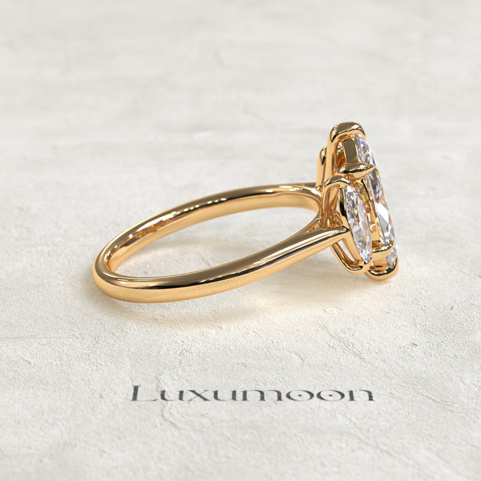 The Aureline - 1.5 CT Marquise Three stone diamond ring