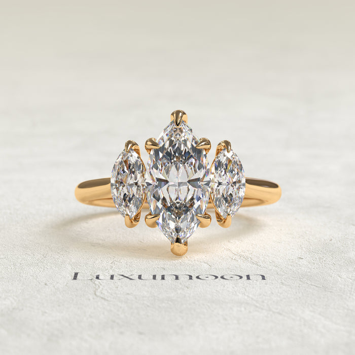The Aureline - 1.5 CT Marquise Three stone diamond ring