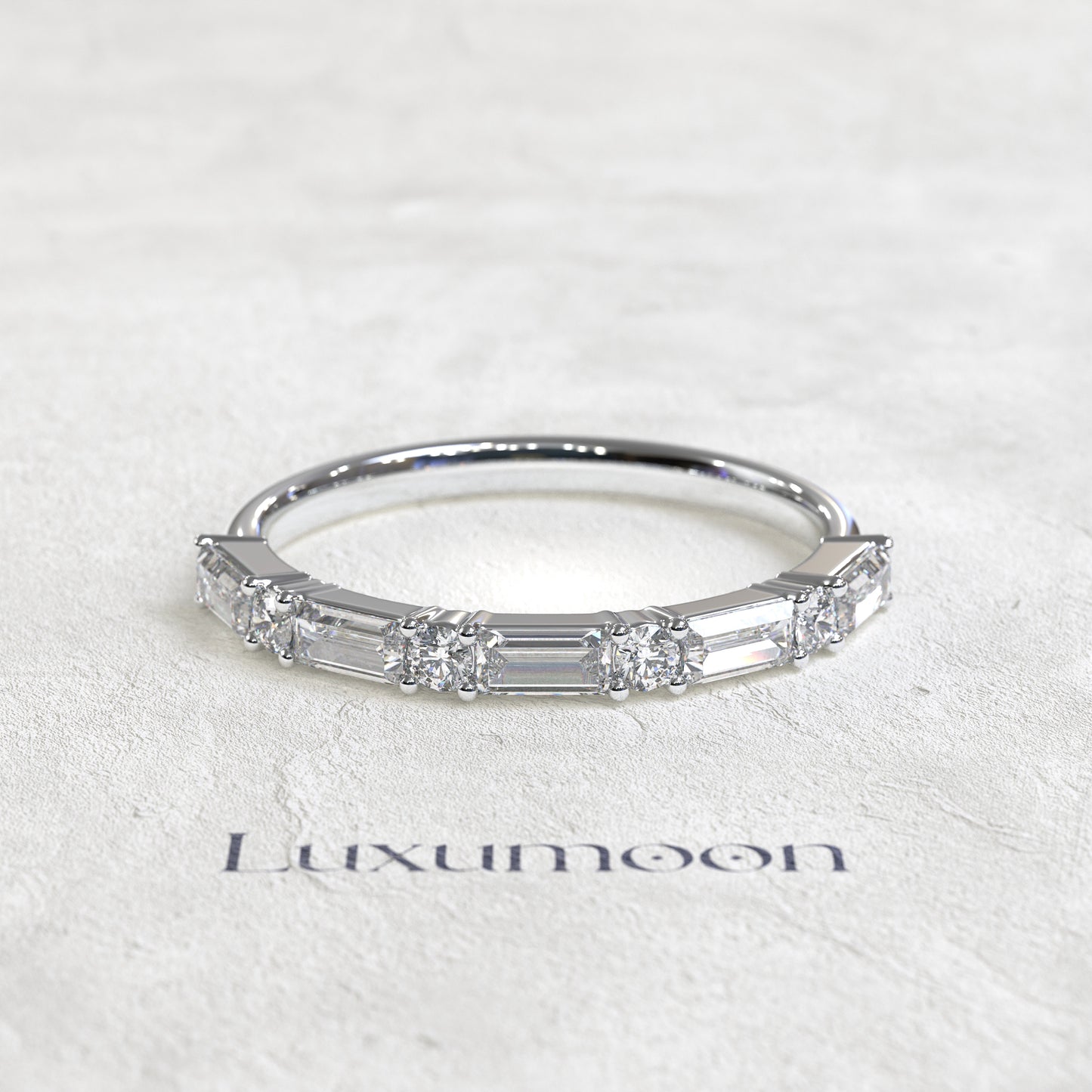 The Elura – East West Baguette & Round Diamond Band