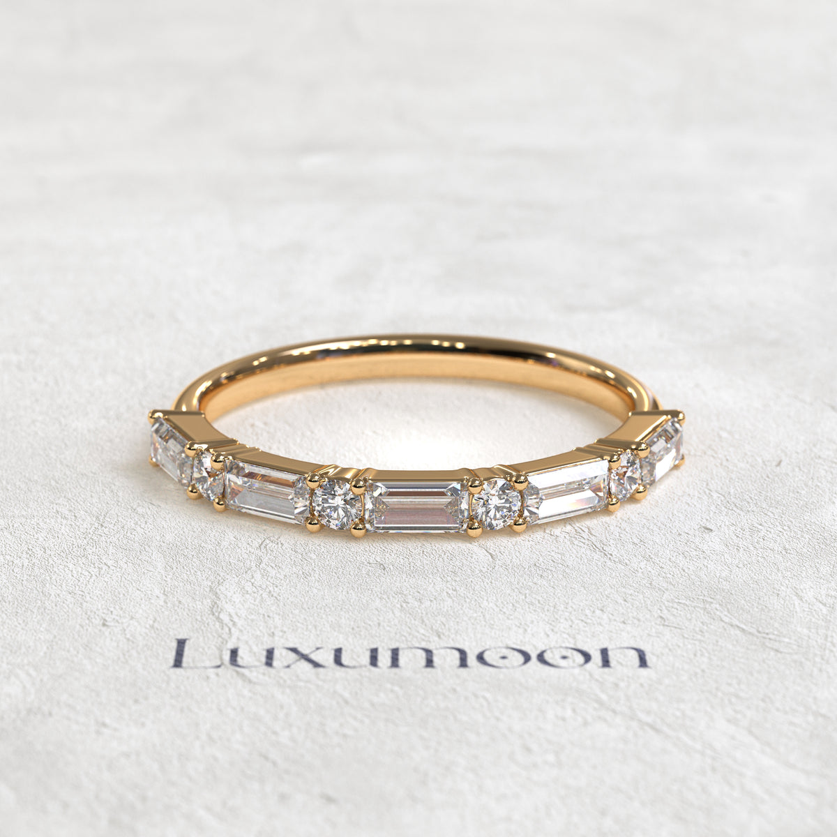 The Elura – East West Baguette & Round Diamond Band