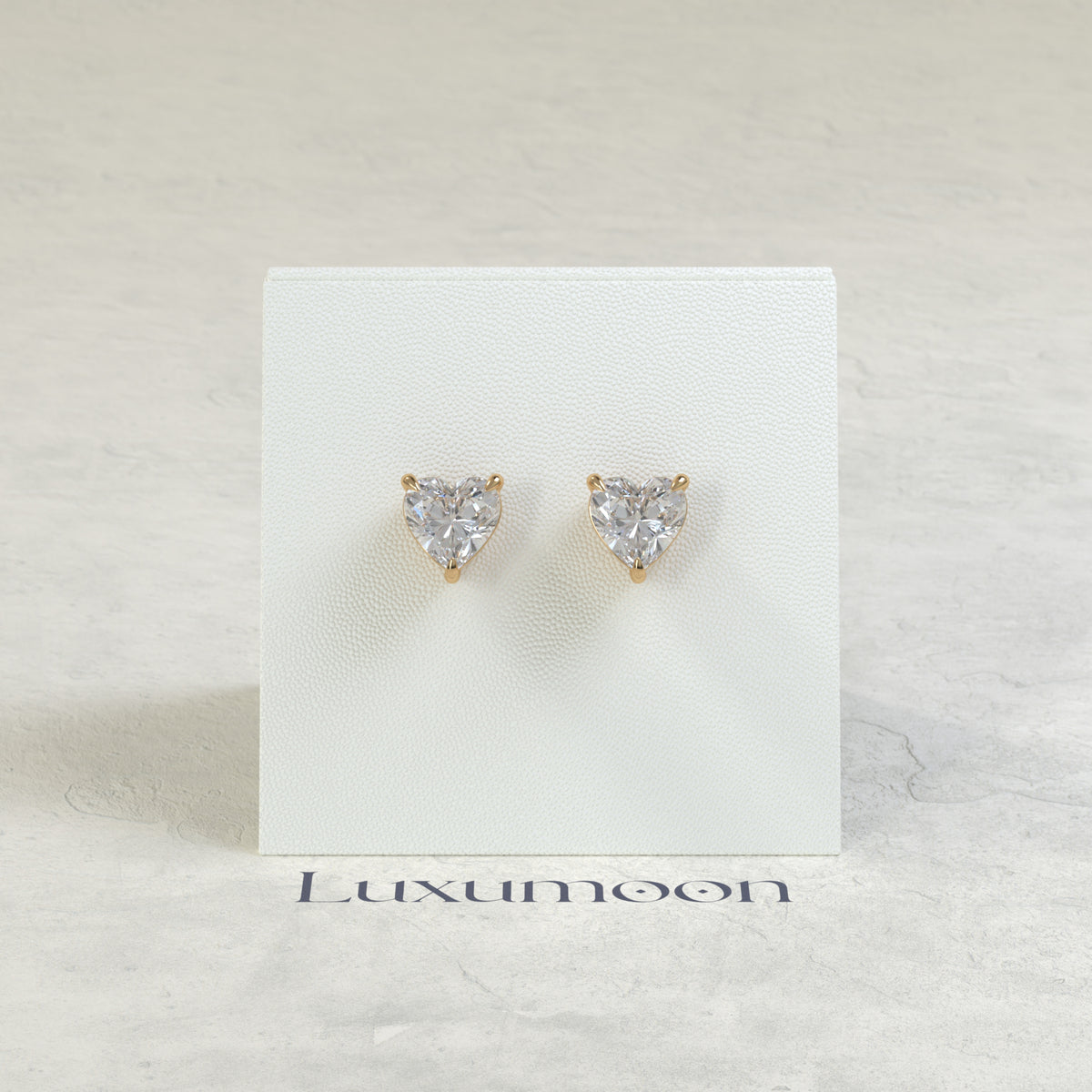The Orin – 3 Ct Heart Diamond Solitaire Studs in Classic Prong Basket