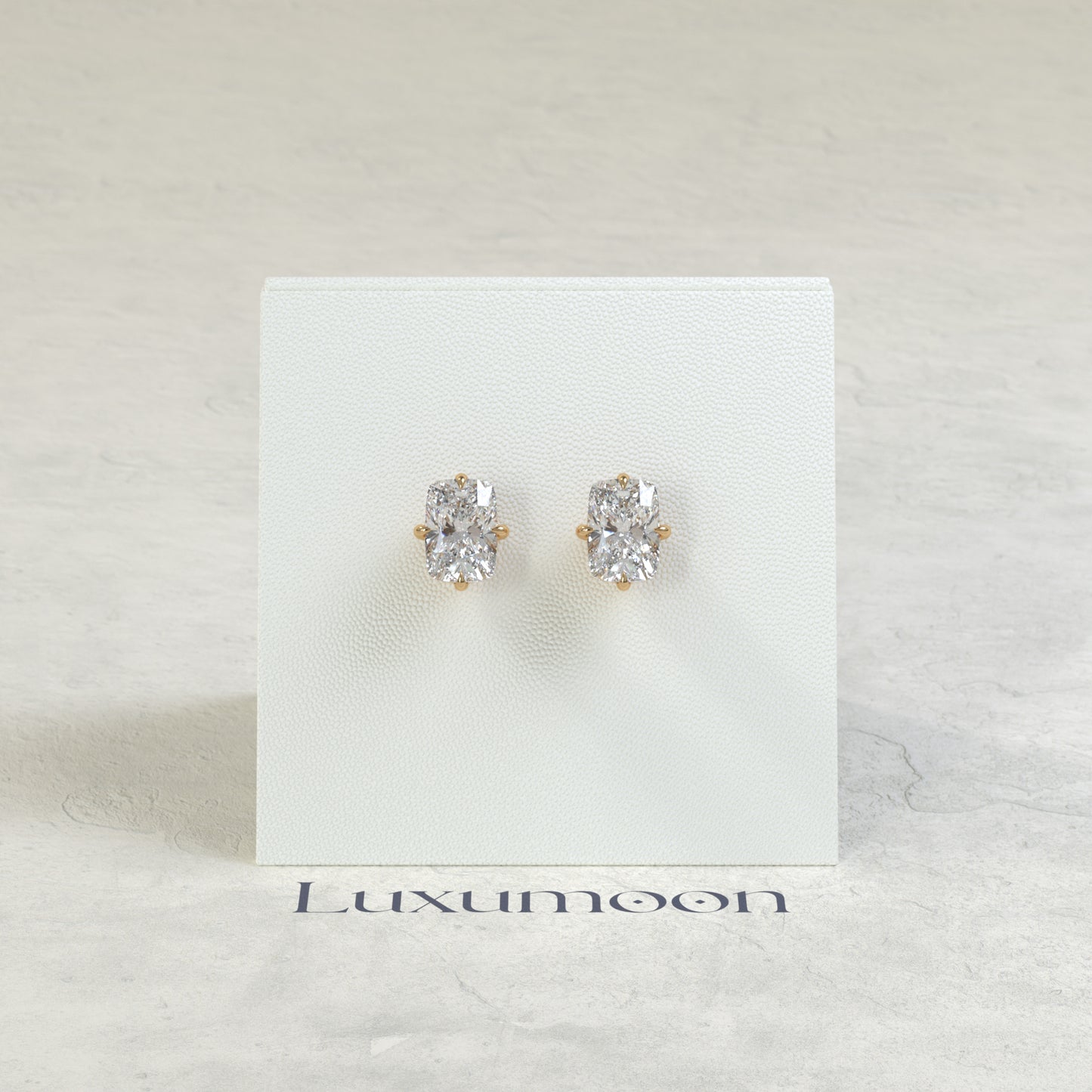 The Nora – 3 Ct Elongated Cushion Diamond Solitaire Studs in East-West Prong Basket