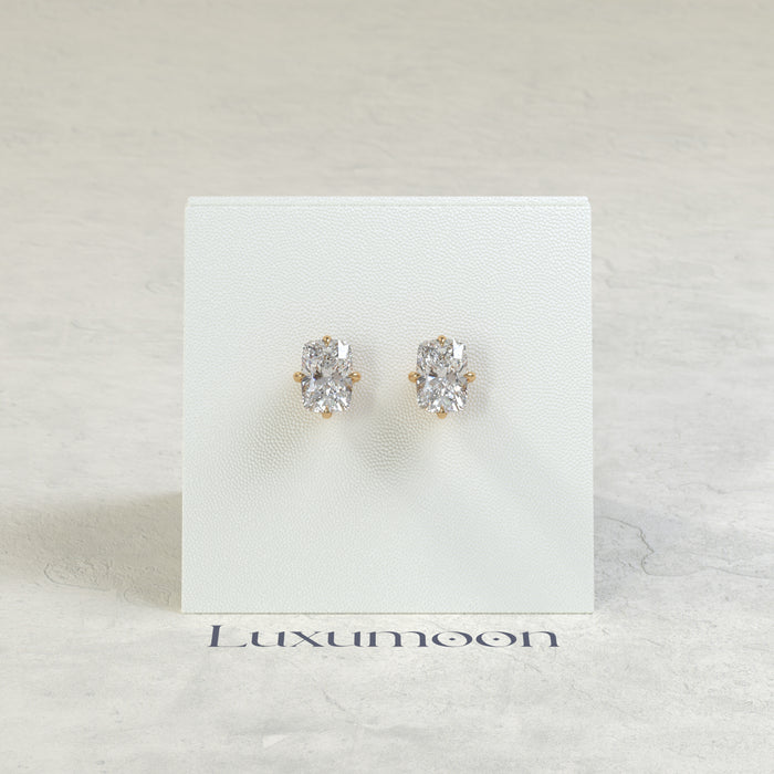 The Nora – 3 Ct Elongated Cushion Diamond Solitaire Studs in East-West Prong Basket