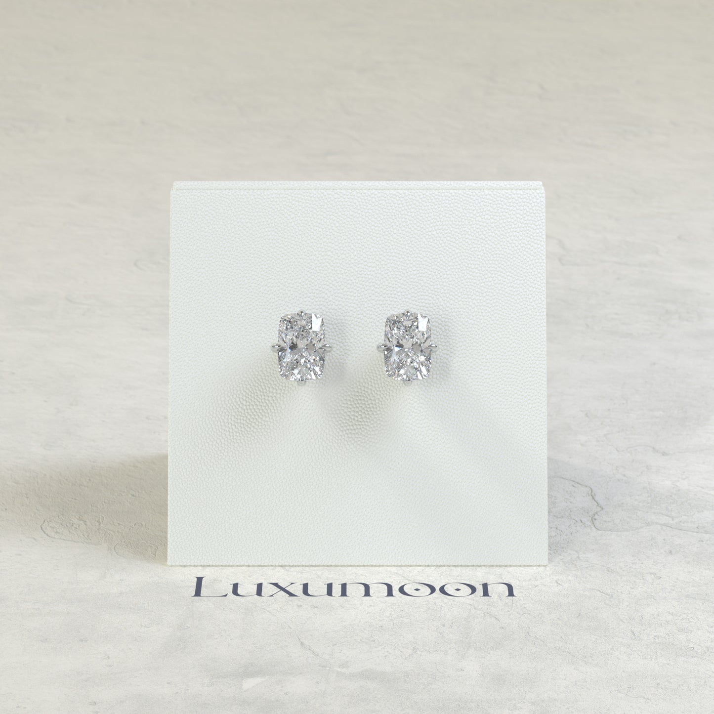 The Nora – 3 Ct Elongated Cushion Diamond Solitaire Studs in East-West Prong Basket