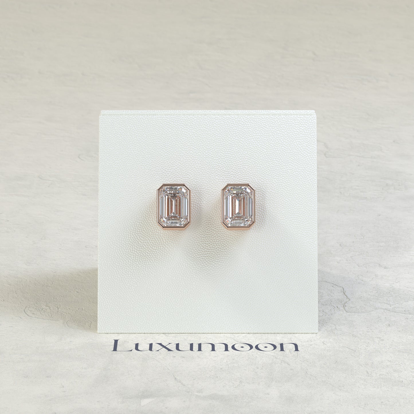 The Rynel – 3 Ct Emerald Cut Diamond Stud Earrings in Full Bezel Setting