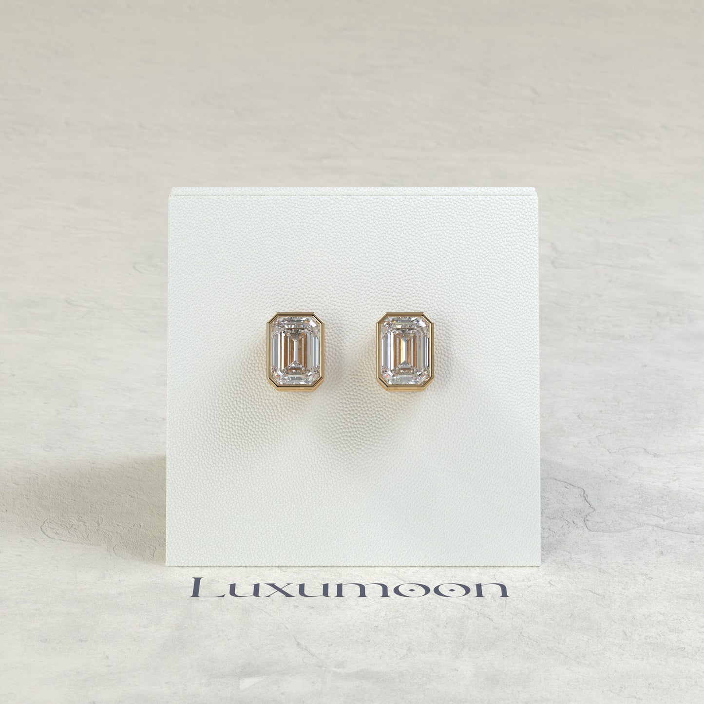 The Rynel – 3 Ct Emerald Cut Diamond Stud Earrings in Full Bezel Setting
