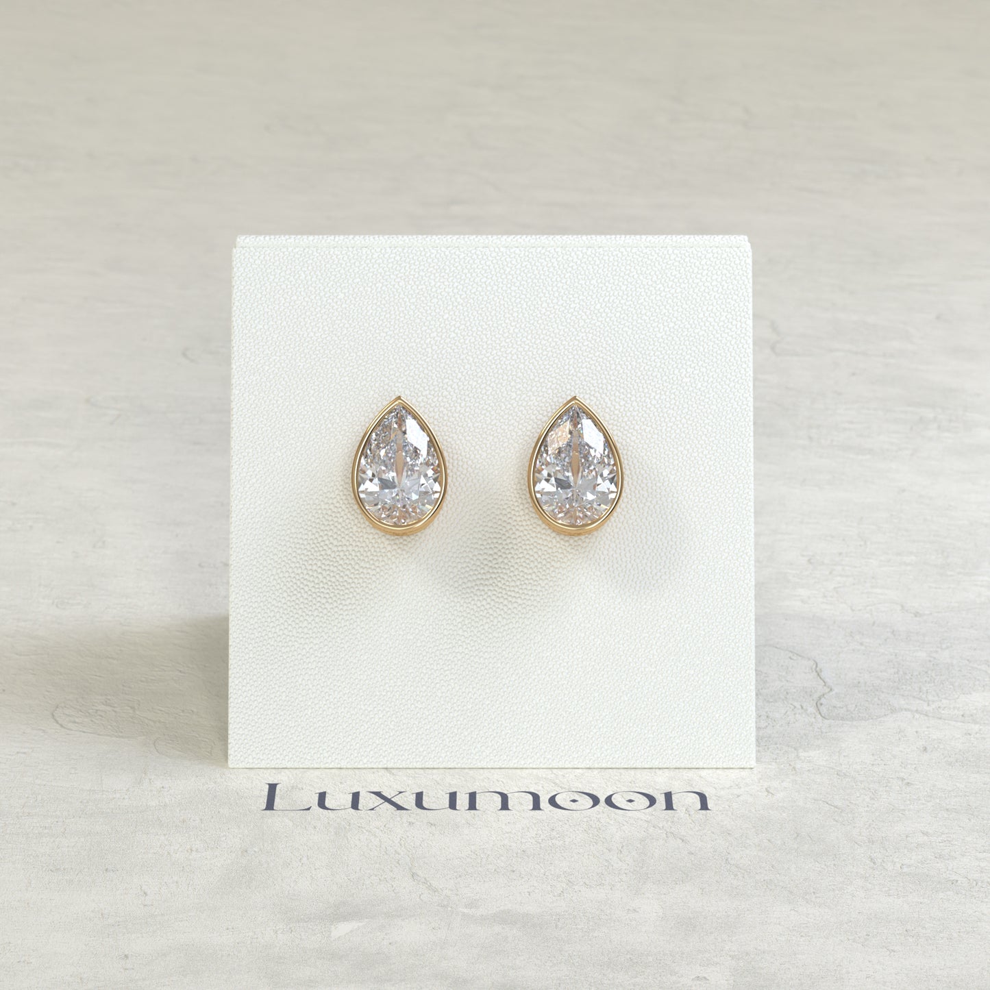 The Toria – 2 Ct Pear Diamond Solitaire Studs in Sleek Full Bezel Setting