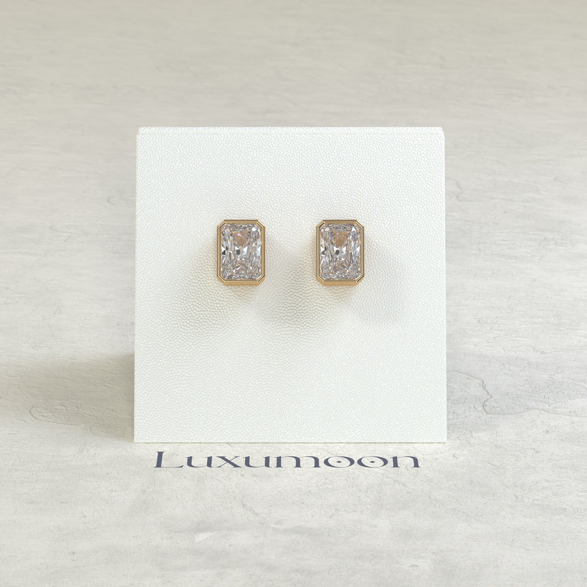 The Ovia – 2 Ct Radiant Diamond Solitaire Studs in Sleek Full Bezel Setting