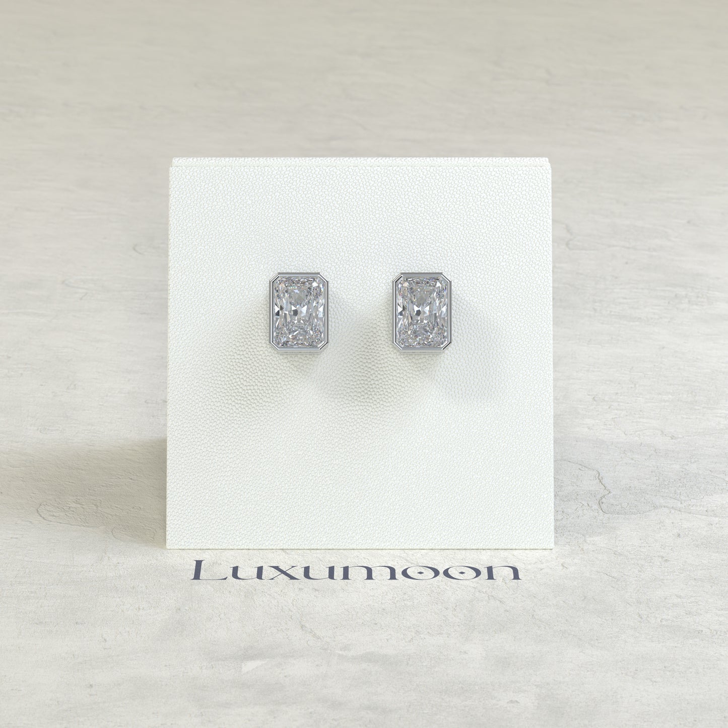 The Ovia – 2 Ct Radiant Diamond Solitaire Studs in Sleek Full Bezel Setting