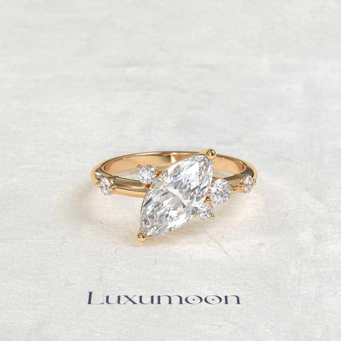 The Ziven – Marquise Solitaire Diamond Ring with Scattered Round Diamond Accents