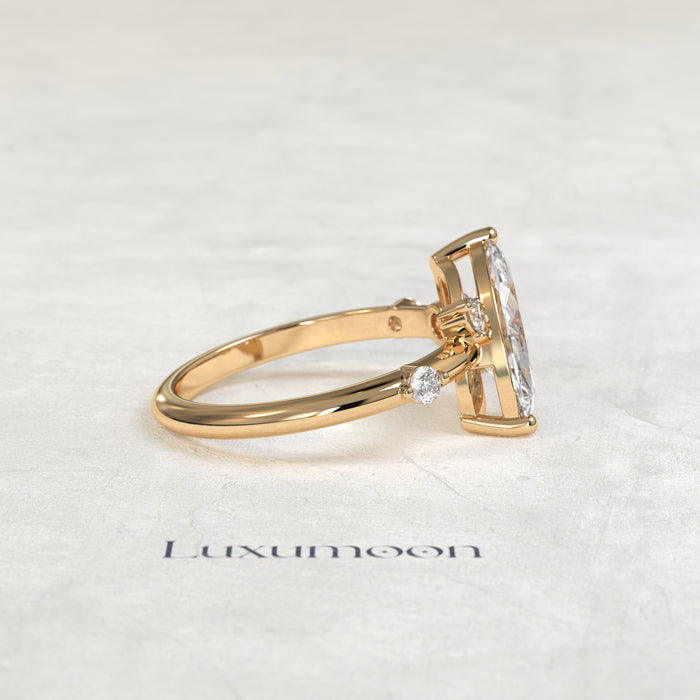 The Ziven – Marquise Solitaire Diamond Ring with Scattered Round Diamond Accents