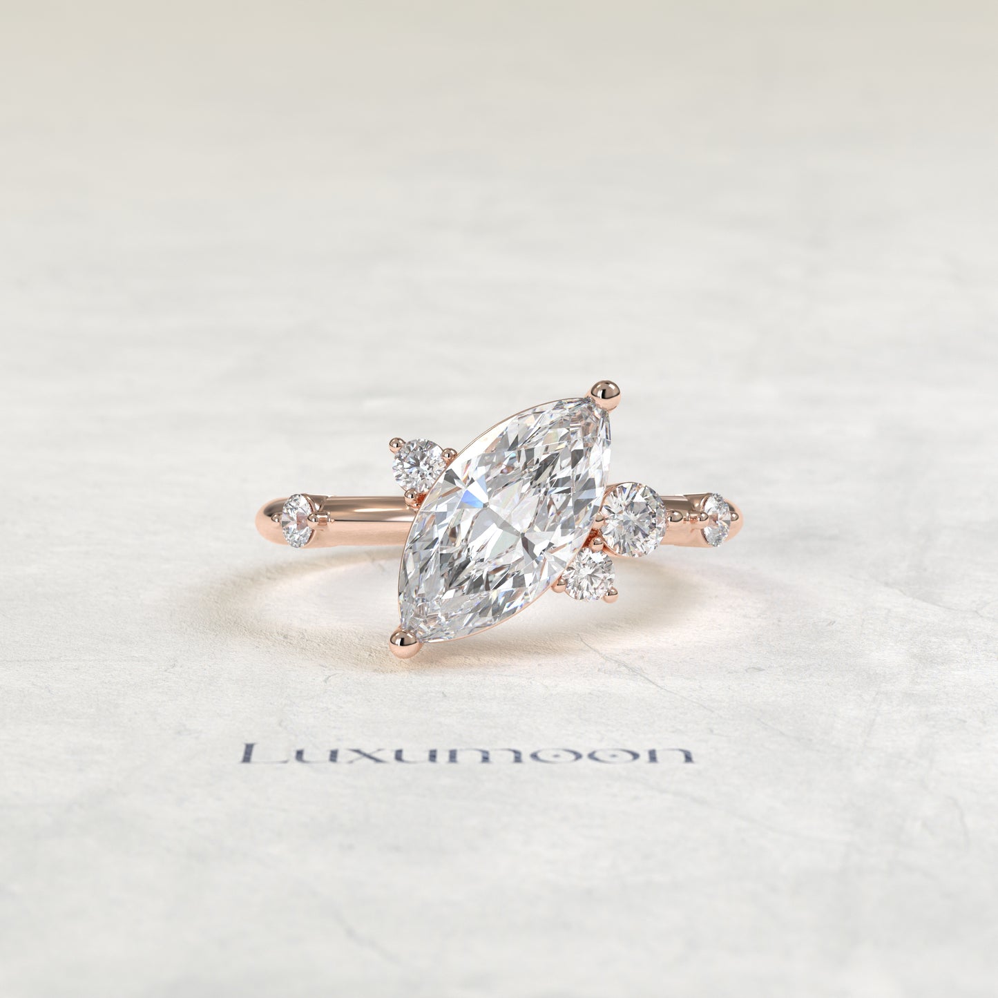 The Ziven – Marquise Solitaire Diamond Ring with Scattered Round Diamond Accents