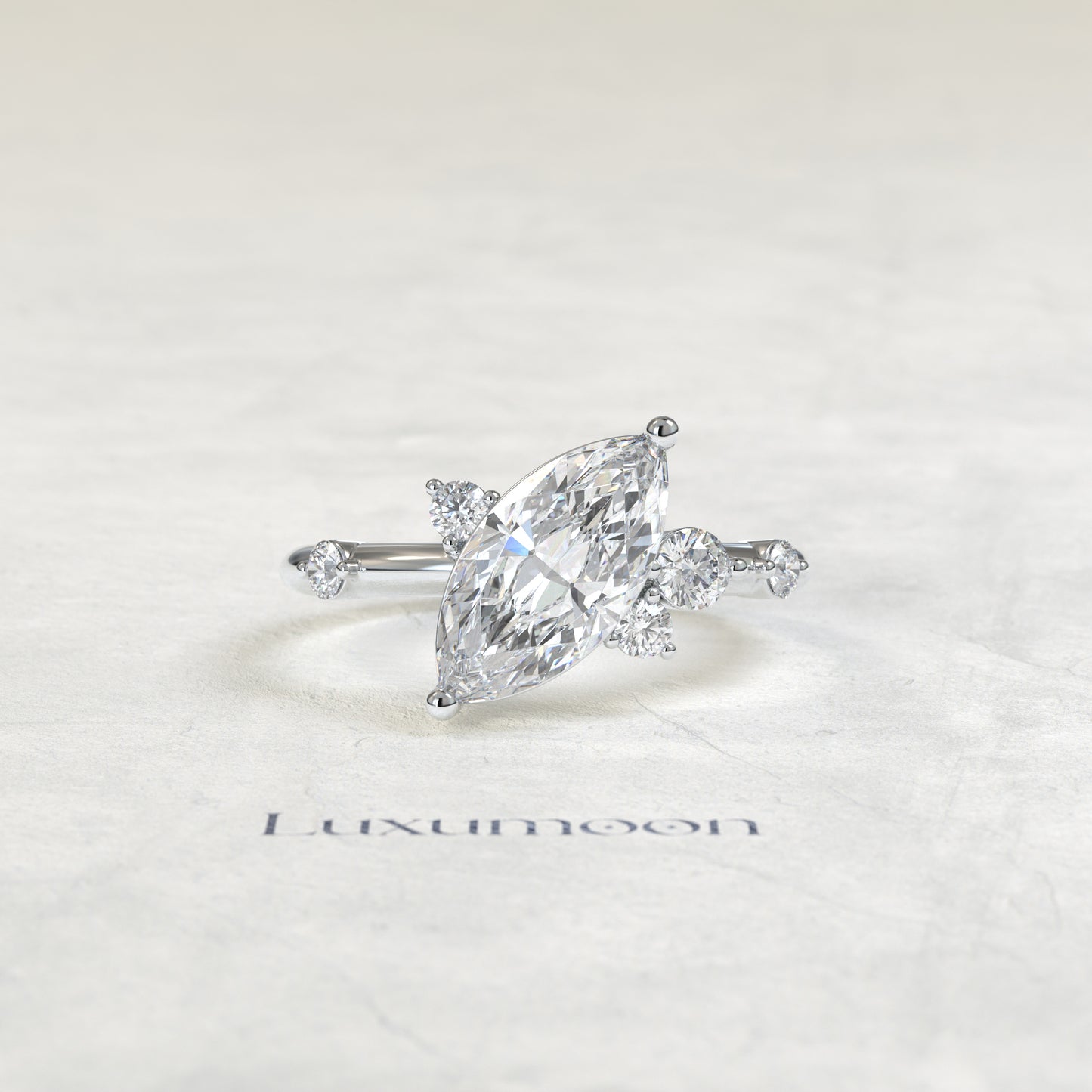 The Ziven – Marquise Solitaire Diamond Ring with Scattered Round Diamond Accents