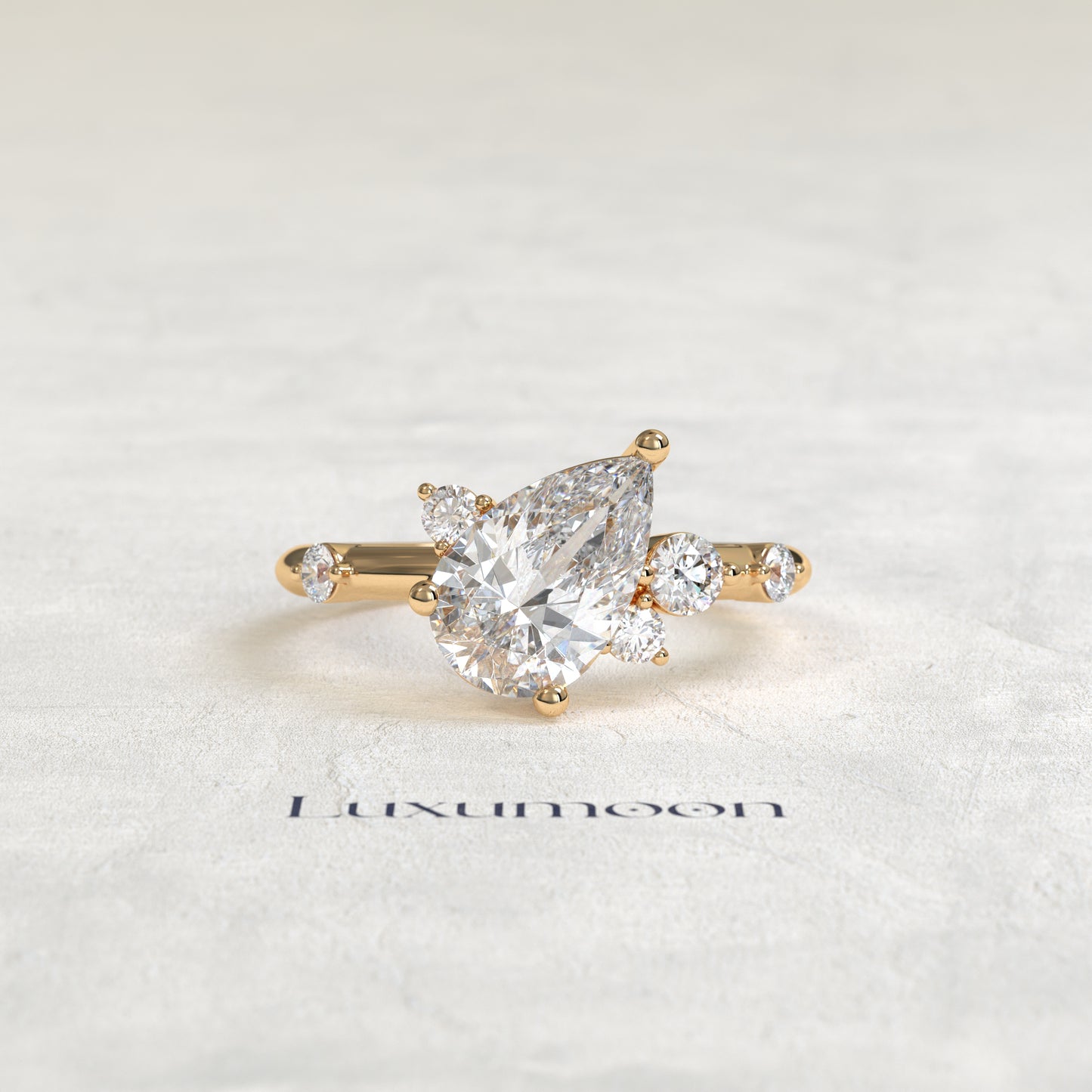 The Aure – Pear Cut Lab Grown Diamond Scattered Accent Engagement Ring