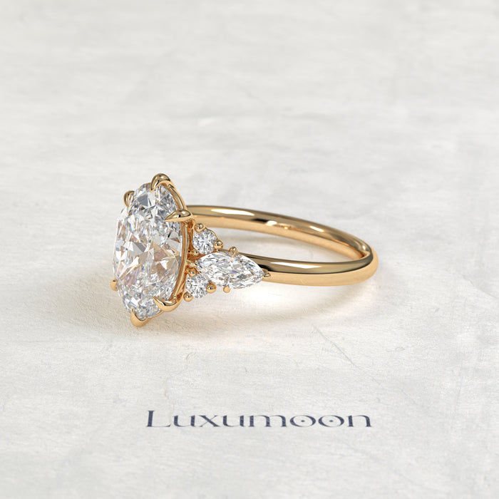 The Lorin – Oval Cut Lab Grown Diamond Marquise Accent Wing Cluster Engagement Ring