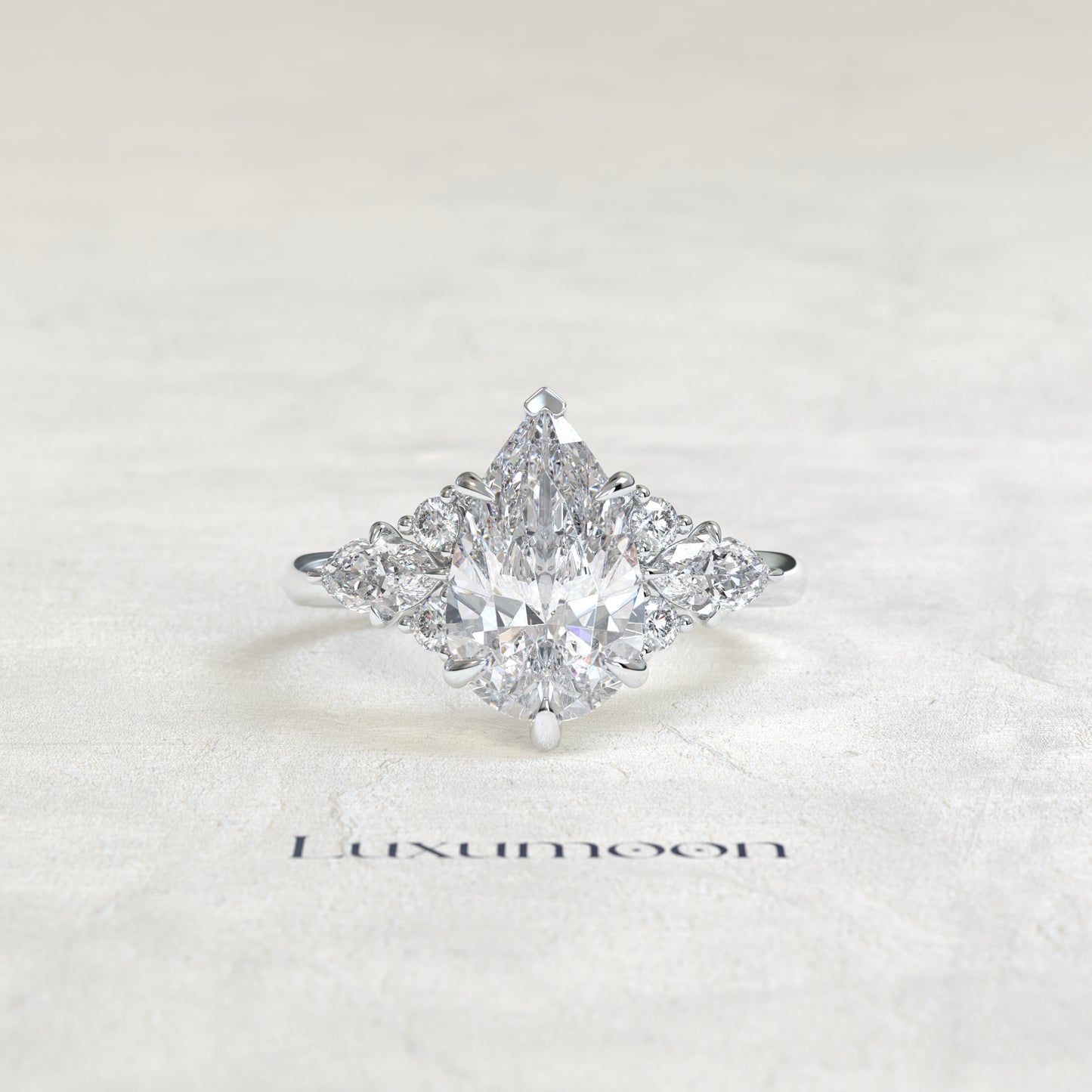 The Myrel – Pear Cut Lab Grown Diamond Marquise & Round Wing Cluster Engagement Ring
