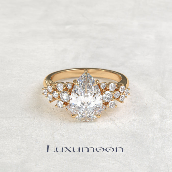 The Cora – Pear Cut Lab Grown Diamond Scattered Round Cluster Shoulder Engagement Ring