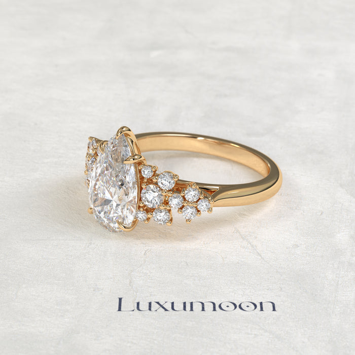 The Cora – Pear Cut Lab Grown Diamond Scattered Round Cluster Shoulder Engagement Ring