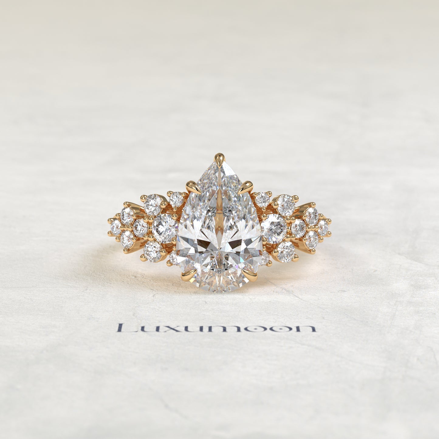 The Cora – Pear Cut Lab Grown Diamond Scattered Round Cluster Shoulder Engagement Ring